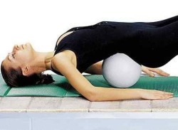 Exercise with a pillow under the lumbar area